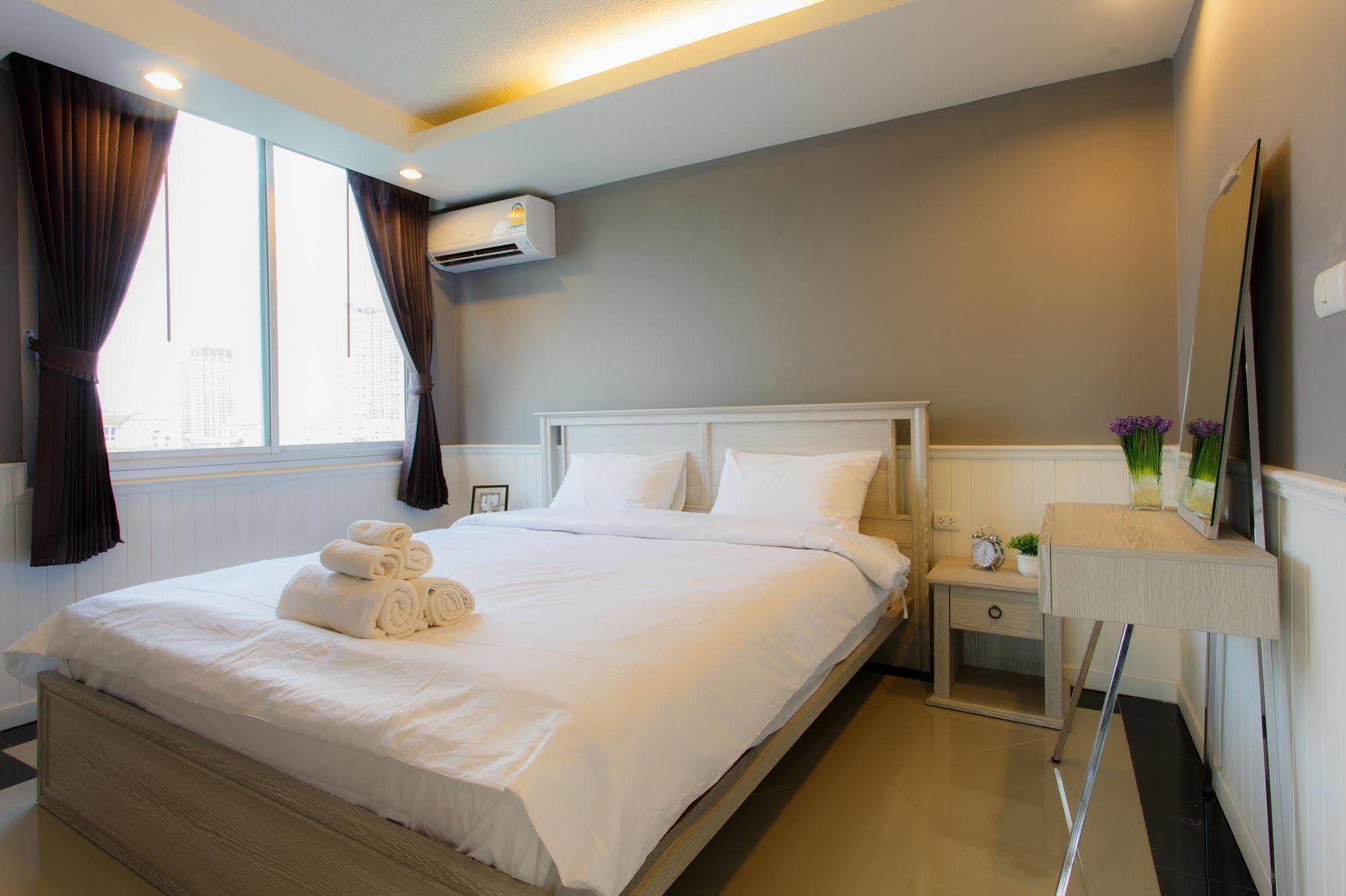 The Capital Resort @ Sukhumvit 50 曼谷 外观 照片 A bedroom in a hotel